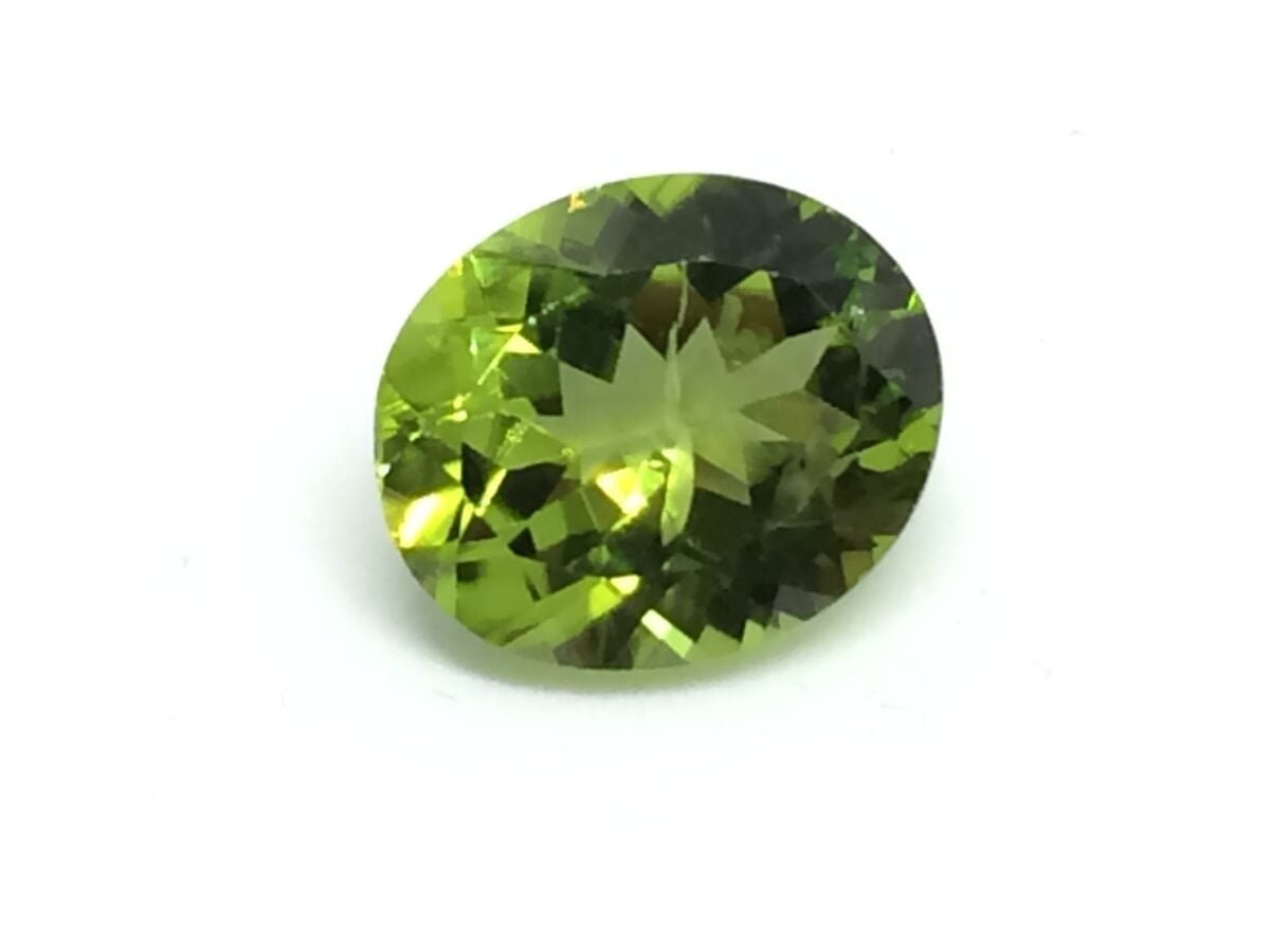 4.66 Carats Peridot ( 5.18 Ratti Peridot ) 2